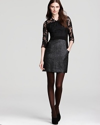 A stunning mix of lace and shimmering metallic thread enhances this floral Nanette Lepore dress withparty-perfect panache. A stunning mix of lace and shimmering metallic thread enhances this floral Nanette Lepore dress withparty-perfect panache.
