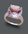 Set the trends in this shimmery statement ring! Crafted in 14k rose gold, ring highlights a cushion-cut pink amethyst (9-1/2 ct. t.w.) edged on the sides by sparkling diamond accents.