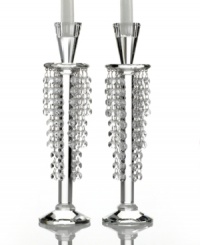 Candlestick meets chandelier in glamorous Barcelona candle holders from Lighting by Design. Glistening beads dangle between the light above and faceted base below for a pair with old-world grandeur. Candlestick meets chandelier in glamorous Barcelona candle holders from Lighting by Design. Glistening beads dangle between the light above and faceted base below for a pair with old-world grandeur.