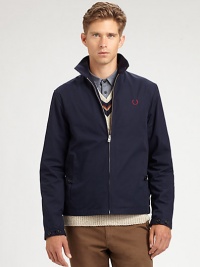 A perfect choice for in-between weather, beat the elements in style with this lightweight jacket rendered in structured cotton with chest logo detail.Zip frontStand collarSide slash pocketsAbout 26 from shoulder to hem65% cotton/35% polyesterDry cleanImported A perfect choice for in-between weather, beat the elements in style with this lightweight jacket rendered in structured cotton with chest logo detail.Zip frontStand collarSide slash pocketsAbout 26 from shoulder to hem65% cotton/35% polyesterDry cleanImported