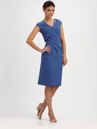 Beyond-modern a fashion-forward sheath with exceptional pleating and classic Princess seams on back. V-neckCrisscross frontCap sleevesPleat detail at waistBack zipBack slitFully linedAbout 25 from natural waist84% polyester/16% polyurethaneDry cleanImported Beyond-modern a fashion-forward sheath with exceptional pleating and classic Princess seams on back. V-neckCrisscross frontCap sleevesPleat detail at waistBack zipBack slitFully linedAbout 25 from natural waist84% polyester/16% polyurethaneDry cleanImported