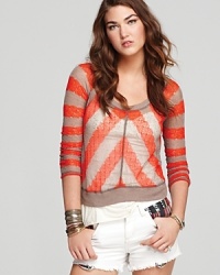 Strawberrey stripes stand out on this sheer Free People sweater, creating a fresh look that teams with crisp white denim jean shorts for the perfect seasonal match-up. Strawberrey stripes stand out on this sheer Free People sweater, creating a fresh look that teams with crisp white denim jean shorts for the perfect seasonal match-up.