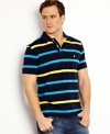 Smooth out your style with the refined look of this pique striped polo shirt from Nautica.