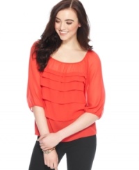 In a sheer georgette, this Studio M top features tiers throughout for a soft spring look! In a sheer georgette, this Studio M top features tiers throughout for a soft spring look!