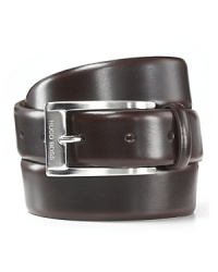 Sleek brown dress belt with silvertone, brushed buckle. Hugo Boss engraved on buckle. Sleek brown dress belt with silvertone, brushed buckle. Hugo Boss engraved on buckle.