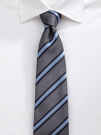 EXCLUSIVELY OURS. A dress wardrobe essential woven in fine Italian silk, for the power player in the boardroom and beyond.About 3½ wideSilkDry cleanMade in Italy EXCLUSIVELY OURS. A dress wardrobe essential woven in fine Italian silk, for the power player in the boardroom and beyond.About 3½ wideSilkDry cleanMade in Italy