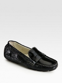 Pebbled patent leather staple has a rubber sole, intricate stitching and concealed cushioning. Patent leather upperLeather liningRubber solePadded insoleImportedOUR FIT MODEL RECOMMENDS ordering true size. Pebbled patent leather staple has a rubber sole, intricate stitching and concealed cushioning. Patent leather upperLeather liningRubber solePadded insoleImportedOUR FIT MODEL RECOMMENDS ordering true size.