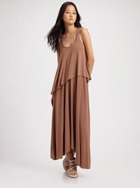 Draped jersey knit hangs in a chic, asymmetrical silhouette for modern styling.Scoopneck Wide straps Asymmetrical hem Scoopback 97% modal/3% spandex Hand wash Imported