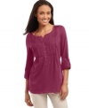 A crisp cotton petite tunic in go-with-anything hues instantly lifts your casual look, from Charter Club.