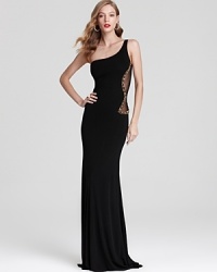 ABS by Allen Schwartz' long and lean gown lends timeless sophistication with a one-shouldered silhouette. Beaded and mesh details lend a fashion-forward finish. ABS by Allen Schwartz' long and lean gown lends timeless sophistication with a one-shouldered silhouette. Beaded and mesh details lend a fashion-forward finish.