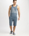 A striped tank updated with a simple patch pocket, in a soft cotton jersey triblend.CrewneckChest patch pocket50% polyester/38% cotton/12% modalMachine washImported