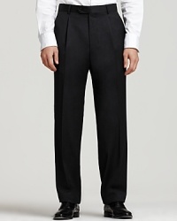 BOSS Black Dr. Hook Trousers. Single reverse pleated pants in virgin wool with rayon viscose lining to knee and unfinished hem. Inner button, hook and button tab closure. Side trouser pockets. Back buttoned welt pockets. 11.5 front rise. 17.5 leg opening.