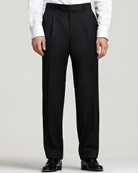 BOSS Black Dr. Hook Trousers. Single reverse pleated pants in virgin wool with rayon viscose lining to knee and unfinished hem. Inner button, hook and button tab closure. Side trouser pockets. Back buttoned welt pockets. 11.5 front rise. 17.5 leg opening. BOSS Black Dr. Hook Trousers. Single reverse pleated pants in virgin wool with rayon viscose lining to knee and unfinished hem. Inner button, hook and button tab closure. Side trouser pockets. Back buttoned welt pockets. 11.5 front rise. 17.5 leg opening.