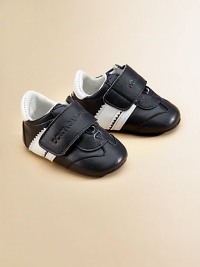 Cozy leather sneakers with grip-tape closure and logo detail.Grip-tape closure70% lambskin/26% cotton/2% goatskin/2% spandex upper94% cotton/6% spandex liningLeather solePadded insoleImported Cozy leather sneakers with grip-tape closure and logo detail.Grip-tape closure70% lambskin/26% cotton/2% goatskin/2% spandex upper94% cotton/6% spandex liningLeather solePadded insoleImported