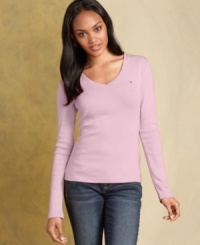 Refresh your wardrobe with Tommy Hilfiger's easy V-neck tee. In a variety of colors, it's perfect for layering on chilly days. Refresh your wardrobe with Tommy Hilfiger's easy V-neck tee. In a variety of colors, it's perfect for layering on chilly days.