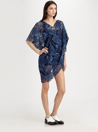 Lacy embroidery in a dramatic pattern dresses up this sheer, artfully draped design.V necklineShort sleevesFront drapeScalloped hemlineAllover nylon embroideryRayonDry cleanImportedModel shown is 5'11 (180cm) wearing US size Small. Lacy embroidery in a dramatic pattern dresses up this sheer, artfully draped design.V necklineShort sleevesFront drapeScalloped hemlineAllover nylon embroideryRayonDry cleanImportedModel shown is 5'11 (180cm) wearing US size Small.