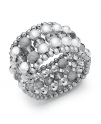 Add a silver streak to your collection. Charter Club's elegant stretch bracelet featuring sandblasted metal beads, copper-coated beads and sparkling glass beads in varying shades of silver. Set in silver tone mixed metal. Approximate length: 7 inches. Add a silver streak to your collection. Charter Club's elegant stretch bracelet featuring sandblasted metal beads, copper-coated beads and sparkling glass beads in varying shades of silver. Set in silver tone mixed metal. Approximate length: 7 inches.