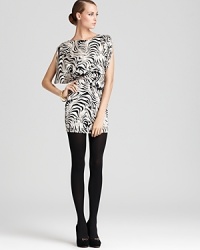 Unleash your animal instincts in this striking zebra-printed Dolce Vita Dress that daringly reveals an alluring back cutout design--it's the quintessential trendsetter of fall. Unleash your animal instincts in this striking zebra-printed Dolce Vita Dress that daringly reveals an alluring back cutout design--it's the quintessential trendsetter of fall.