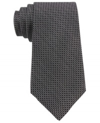 A micro-pattern and skinny construction make this DKNY tie the perfect addition to your modern mix. A micro-pattern and skinny construction make this DKNY tie the perfect addition to your modern mix.