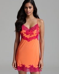Bring a splash of color to your life with this vibrant, slinky slip from Natori.