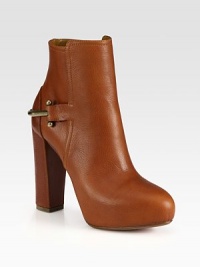 A western-inspired metal insert wraps around the towering heel of this leather silhouette. Self-covered heel, 5 (125mm)Covered platform, 1 (25mm)Compares to a 4 heel (100mm)Leather upperSide zipLeather lining and solePadded insoleMade in Italy A western-inspired metal insert wraps around the towering heel of this leather silhouette. Self-covered heel, 5 (125mm)Covered platform, 1 (25mm)Compares to a 4 heel (100mm)Leather upperSide zipLeather lining and solePadded insoleMade in Italy