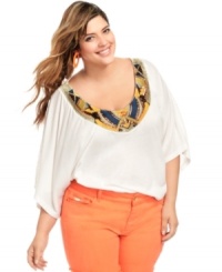 Look cool from all angles with Baby Phat's dolman sleeve plus size top, featuring an embellished neckline and crocheted back. Look cool from all angles with Baby Phat's dolman sleeve plus size top, featuring an embellished neckline and crocheted back.