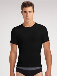 The classic crew is redefined in high-stretch cotton that firms the chest as it flattens the stomach. Crewneck Improves posture Supports lower back No bulk under clothing Tapered shape 81% cotton/19% spandex; machine wash Imported The classic crew is redefined in high-stretch cotton that firms the chest as it flattens the stomach. Crewneck Improves posture Supports lower back No bulk under clothing Tapered shape 81% cotton/19% spandex; machine wash Imported