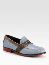A traditional loafer style is redefined by colorful contrasts, in finely textured leather.Leather upperLeather liningPadded insoleLeather soleImported A traditional loafer style is redefined by colorful contrasts, in finely textured leather.Leather upperLeather liningPadded insoleLeather soleImported