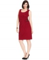 Wow them at work in Alfani's sleeveless plus size dress, accented by a pleated front.
