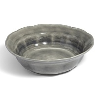 Featuring a flower petal shaped edge, subtle variations in color make each handmade salad bowl unique. Featuring a flower petal shaped edge, subtle variations in color make each handmade salad bowl unique.