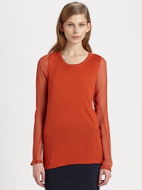 Concluded by an airy back, this utterly soft top has silk and cashmere trim and semi-sheer sleeves. RoundneckLong, semi-sheer sleevesSemi-sheer at upper backLonger length hits below the hipsBody: 49% viscose/44% modal/5% cashmere; Contrast: SilkDry cleanImported of Italian fabricModel shown is 5'10 (177cm) wearing US size Small. Concluded by an airy back, this utterly soft top has silk and cashmere trim and semi-sheer sleeves. RoundneckLong, semi-sheer sleevesSemi-sheer at upper backLonger length hits below the hipsBody: 49% viscose/44% modal/5% cashmere; Contrast: SilkDry cleanImported of Italian fabricModel shown is 5'10 (177cm) wearing US size Small.