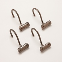 Bronzed and beautiful, these metal hooks complement classic bathroom decor. Bronzed and beautiful, these metal hooks complement classic bathroom decor.