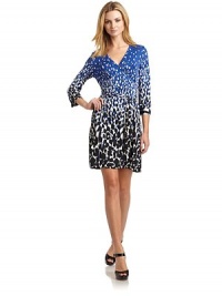 THE LOOKAbstract animal printSurplice v-necklineWrap-front styleThree-quarter length sleeves with vented cuffsSelf sash ties around the waistTHE FITAbout 34 from shoulder to hemTHE MATERIAL92% polyester/8% spandex CARE & ORIGINMachine washImportedModel shown is 5'9½ (176cm) wearing US size Small. THE LOOKAbstract animal printSurplice v-necklineWrap-front styleThree-quarter length sleeves with vented cuffsSelf sash ties around the waistTHE FITAbout 34 from shoulder to hemTHE MATERIAL92% polyester/8% spandex CARE & ORIGINMachine washImportedModel shown is 5'9½ (176cm) wearing US size Small.