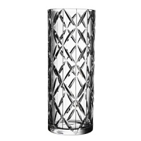 Ingegerd Raman is renowned for the stylish simplicity of her designs, creating best-sellers for Orrefors with an elegance and purity that is second to none. With Crystal Tone, she presents a collection of cylindrical vases and low, wide bowls decorated with a graceful pattern of gently rounded cuts. Vase measures 14 3/4 h x 5 7/8 w. Ingegerd Raman is renowned for the stylish simplicity of her designs, creating best-sellers for Orrefors with an elegance and purity that is second to none. With Crystal Tone, she presents a collection of cylindrical vases and low, wide bowls decorated with a graceful pattern of gently rounded cuts. Vase measures 14 3/4 h x 5 7/8 w.