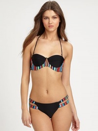 An uplifting, va-va-va voom silhouette is courtesy of the bustier top. The look-at-me-now bottom features a colorful duo of straps on each side. Removable halter strapBack tie closureStretch bottomFully lined80% nylon/20% spandexHand washMade in USA An uplifting, va-va-va voom silhouette is courtesy of the bustier top. The look-at-me-now bottom features a colorful duo of straps on each side. Removable halter strapBack tie closureStretch bottomFully lined80% nylon/20% spandexHand washMade in USA