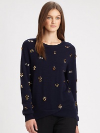 A sort of visual pun, this delightful pullover is sprinkled with jeweled eyes and beaded lashes for a striking and witty look.Ribbed crew necklineLong sleeves with ribbed cuffsWide ribbed waist with contour crossover frontPlain backAbout 27 from shoulder to hemWoolSpot cleanImportedSIZE & FITModel shown is 5'10 (177cm) wearing US size Small. A sort of visual pun, this delightful pullover is sprinkled with jeweled eyes and beaded lashes for a striking and witty look.Ribbed crew necklineLong sleeves with ribbed cuffsWide ribbed waist with contour crossover frontPlain backAbout 27 from shoulder to hemWoolSpot cleanImportedSIZE & FITModel shown is 5'10 (177cm) wearing US size Small.
