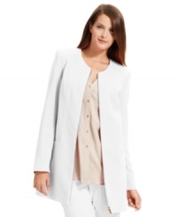 This structured jacket from Calvin Klein is designed with a collarless neckline that emphasizes the minimalist styling. This structured jacket from Calvin Klein is designed with a collarless neckline that emphasizes the minimalist styling.