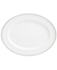 Timeless in white bone china, this Wedgwood oval platter is adorned with a band of flecked pewter and precious platinum trim. Pair with the pale blue florals of Patina Platinum dinnerware. Timeless in white bone china, this Wedgwood oval platter is adorned with a band of flecked pewter and precious platinum trim. Pair with the pale blue florals of Patina Platinum dinnerware.