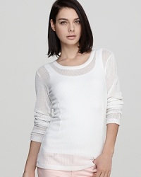 This rag&bone/JEAN tee updates the classic style with ribbing and a sheer texture for a spring-ready look you can wear with color denim and frayed cut-offs. This rag&bone/JEAN tee updates the classic style with ribbing and a sheer texture for a spring-ready look you can wear with color denim and frayed cut-offs.