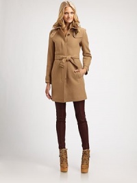 Featuring a waist-defining belt, a simply brilliant style with timeless military details.Stand collarEpaulettesGunflapConcealed button closure Belted styleSlash pocketsBack yokeBack princess seamsBack ventAbout 33 from shoulder to hemWool/polyamide/cashmereDry cleanImportedSIZE & FIT Model shown is 5'10½ (179cm) wearing a US size 4.This style runs true to size. We recommend ordering your usual size for a standard fit. Featuring a waist-defining belt, a simply brilliant style with timeless military details.Stand collarEpaulettesGunflapConcealed button closure Belted styleSlash pocketsBack yokeBack princess seamsBack ventAbout 33 from shoulder to hemWool/polyamide/cashmereDry cleanImportedSIZE & FIT Model shown is 5'10½ (179cm) wearing a US size 4.This style runs true to size. We recommend ordering your usual size for a standard fit.