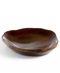 Hand-carved in fast-growing obeche wood, this rustic platter is an ode to the Haitian mountainside and designed by Haiti's master woodwork artist, Einstein Albert. A unique centerpiece on your table, it's a beautiful way to serve fruit, cheese and more. Hand-carved in fast-growing obeche wood, this rustic platter is an ode to the Haitian mountainside and designed by Haiti's master woodwork artist, Einstein Albert. A unique centerpiece on your table, it's a beautiful way to serve fruit, cheese and more.