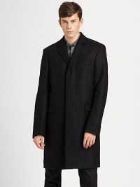 A sharp, streamlined topper, this single-breasted silhouette is constructed from a superior wool blend for incredible warmth. Button frontChest welt pocketWaist flap pocketsBack ventFully linedAbout 39 from shoulder to hemWool/nylonDry cleanImported A sharp, streamlined topper, this single-breasted silhouette is constructed from a superior wool blend for incredible warmth. Button frontChest welt pocketWaist flap pocketsBack ventFully linedAbout 39 from shoulder to hemWool/nylonDry cleanImported