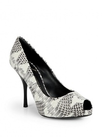 THE LOOKPeep toePadded insoleLeather heel 4 (100mm)Self-covered platform ½ (15mm)Compares to 3½ (90mm)THE MATERIALWatersnake-print upperLeather lining and soleORIGINMade in Italy THE LOOKPeep toePadded insoleLeather heel 4 (100mm)Self-covered platform ½ (15mm)Compares to 3½ (90mm)THE MATERIALWatersnake-print upperLeather lining and soleORIGINMade in Italy