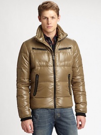 Constructed in Teflon® and complete with a hidden hood, this sporty coat is the ultimate winter essential. Stand collar with hidden hoodFront zip closureLong ribbed knit cuff sleevesChest and front zip pocketsLogo patch on armAbout 27 from shoulder to hemNylonFully linedFill: downDry cleanImported Constructed in Teflon® and complete with a hidden hood, this sporty coat is the ultimate winter essential. Stand collar with hidden hoodFront zip closureLong ribbed knit cuff sleevesChest and front zip pocketsLogo patch on armAbout 27 from shoulder to hemNylonFully linedFill: downDry cleanImported