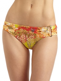 THE LOOKBotanical printElastic waist and leg openingsRuched at one side with dragon ringFull coverage bottomTHE MATERIAL92% nylon/8% spandexFully linedCARE & ORIGINHand washImportedPlease note: Bikini top sold separately. THE LOOKBotanical printElastic waist and leg openingsRuched at one side with dragon ringFull coverage bottomTHE MATERIAL92% nylon/8% spandexFully linedCARE & ORIGINHand washImportedPlease note: Bikini top sold separately.