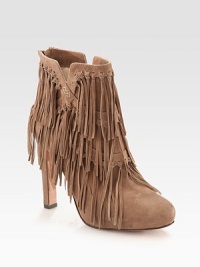 Allover fringe, hidden platform and an exposed back zipper enliven this on-trend, suede ankle boot. Self-covered heel, 4½ (115mm)Hidden platform, ½ (15mm)Compares to a 4 heel (100mm)Suede upperBack zipperLeather lining and solePadded insoleImported