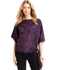 A richly hued pattern inspired by peacock feathers adds a sense of luxury to MICHAEL Michael Kors' latest top.