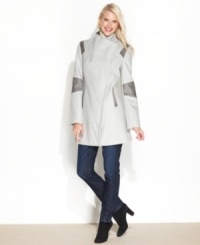 Modern styling elevates this coat from Calvin Klein. Its sleek colorblocking and faux-leather trim add dimension and flair to your winter wardrobe! Modern styling elevates this coat from Calvin Klein. Its sleek colorblocking and faux-leather trim add dimension and flair to your winter wardrobe!