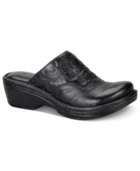 Slip-on style that's oh-so-sweet. Born's Edin mules feature Western-style stitching and a moderate heel. Slip-on style that's oh-so-sweet. Born's Edin mules feature Western-style stitching and a moderate heel.