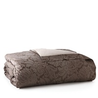 Egyptian cotton is woven in Italy into a serene and sweet sateen jacquard. Large scrolls play across the shining surface of the duvet covers and shams, each finished with a plain hem and decorated with a subtle flange.The duvet covers are backed in a plain sateen while the shams feature the jacquard pattern on the front and back. Egyptian cotton is woven in Italy into a serene and sweet sateen jacquard. Large scrolls play across the shining surface of the duvet covers and shams, each finished with a plain hem and decorated with a subtle flange.The duvet covers are backed in a plain sateen while the shams feature the jacquard pattern on the front and back.